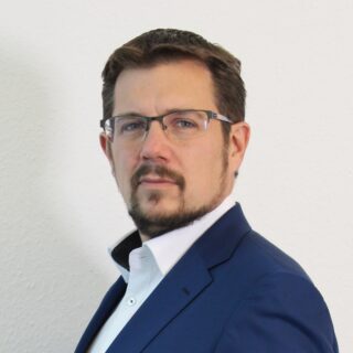 Porträt von Dr. Max Kunze von Primestone Consulting